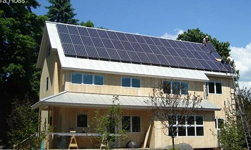 Exterior of Ross Residence showing solar panels on roof